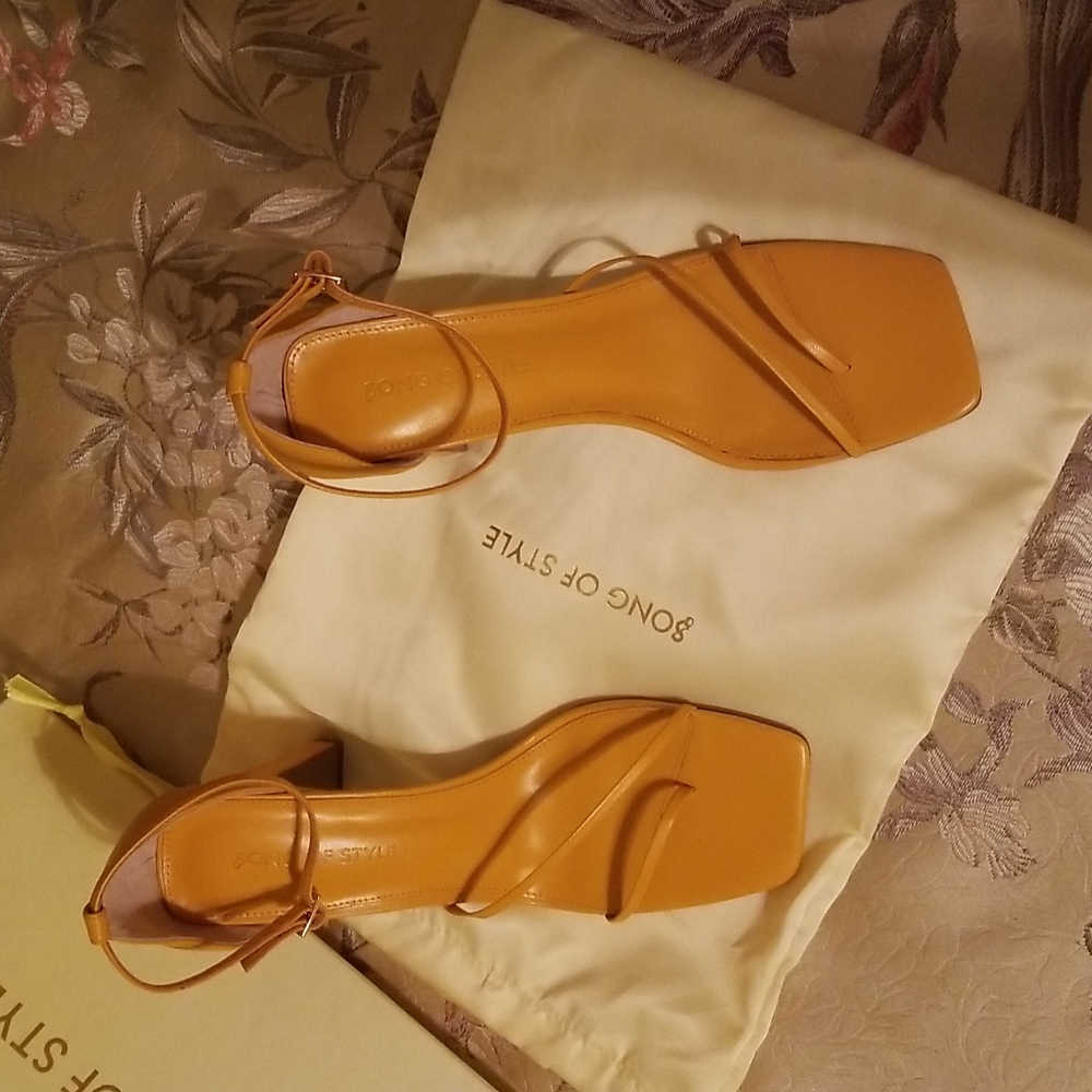 High heel shoes. Tangerine color. 3.75" heel. Never worn. Size 9.5